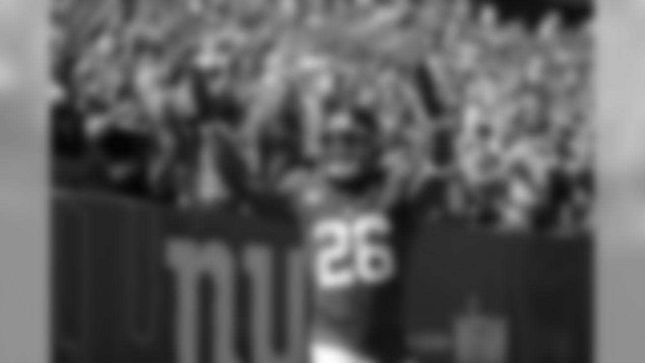 New York Giants' Saquon Barkley celebrates his touchdown during the first half of an NFL football game against the Buffalo Bills, Sunday, Sept. 15, 2019, in East Rutherford, N.J. (AP Photo/Adam Hunger)