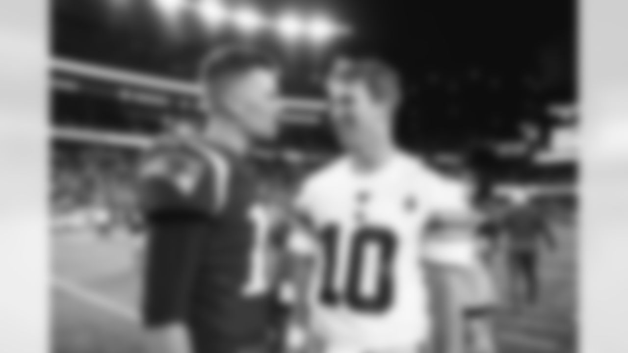 New York Giants QB Eli Manning (10) & Patriots QB Tom Brady (12) during a preseason week 4 game against the New York Jets at MetLife Stadium in East Rutherford, NJ