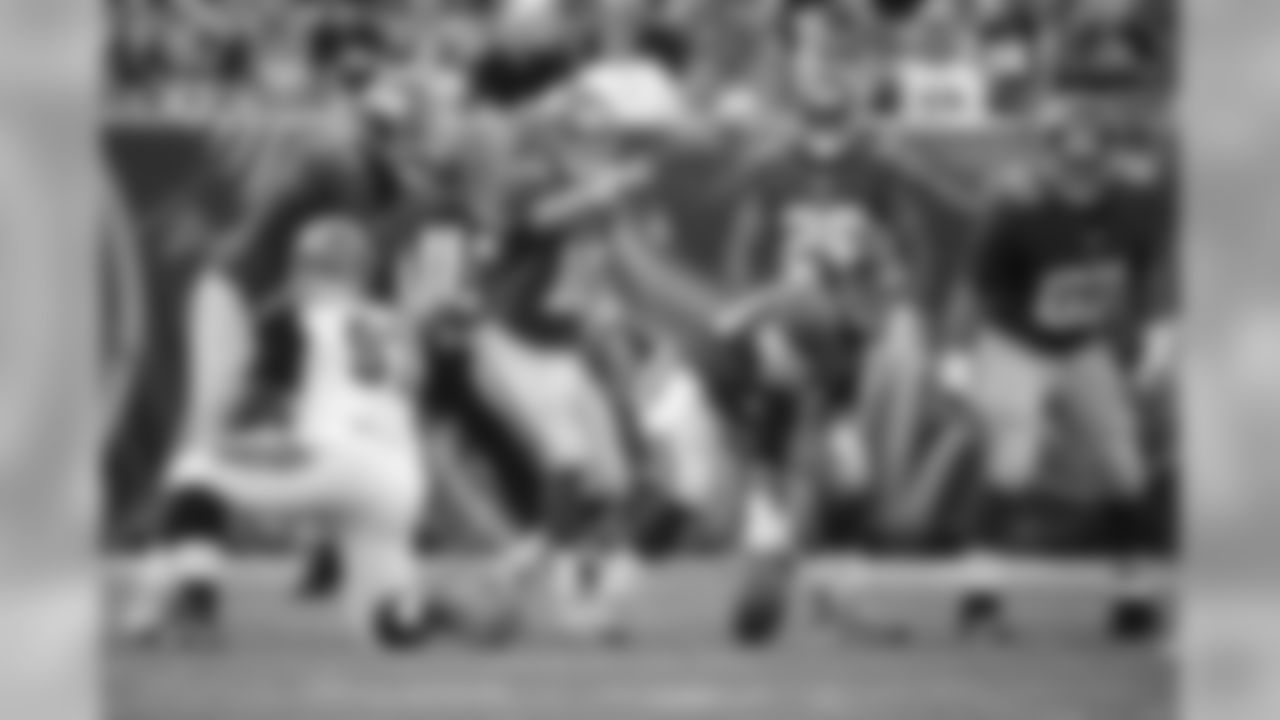 QB ELI MANNING, OL WESTON RICHBURG, TACKLE JUSTIN PUGH
