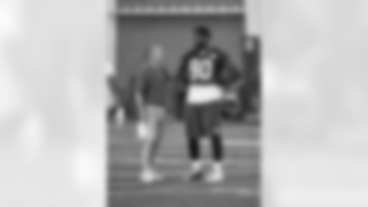 New York Giants defensive end Jason Pierre-Paul (90) talks with defensive coordinator Steve Spagnuolo during NFL training camp practice on July 29, 2016 at the Quest Diagnostics Training Center in East Rutherford, New Jersey. (Evan Pinkus via AP)