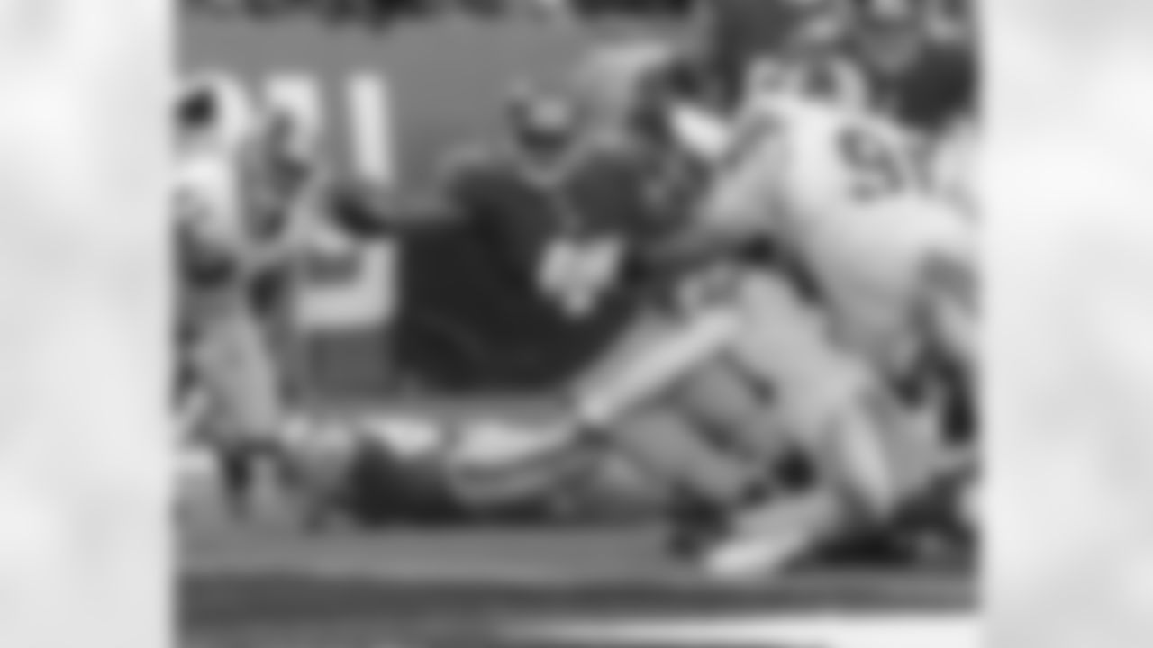 RB Ahmad Bradshaw reaches over for his second touchdown of the game.