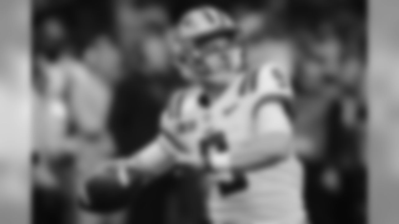 LSU quarterback Joe Burrow warms up before a NCAA College Football Playoff national championship game against Clemson Monday, Jan. 13, 2020, in New Orleans. (AP Photo/Gerald Herbert)