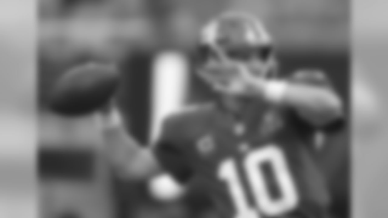 Quarterback: A"Eli Manning was 75 percent passing, 21-for-28, and that was a result of the running game being solid, too. He made some good throws, and they had some yards after the catch and no drops. All that helps the quarterback improve his performance."