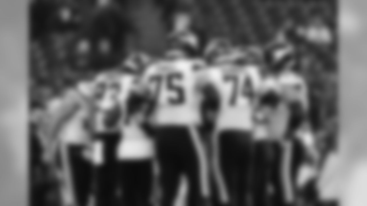 Minnesota Vikings offensive tackle Brian O'Neill (75) and Minnesota Vikings offensive guard Mike Remmers (74) in a offensive group huddle during an NFL regular season football game against the New England Patriots on Sunday, Dec. 2, 2018 in Foxborough, Mass. The Patriots won the game, 24-10. (Ric Tapia via AP)