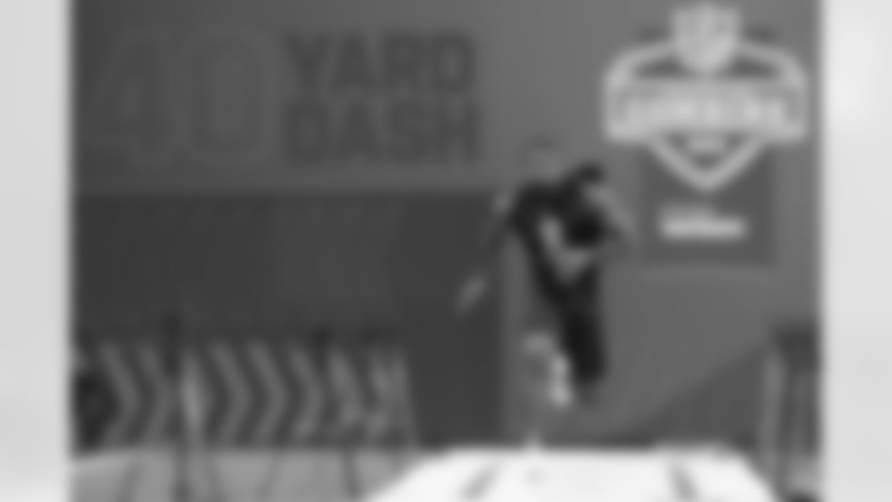 Mississippi running back Snoop Conner runs the 40-yard dash during the NFL football scouting combine, Friday, March 4, 2022, in Indianapolis. (AP Photo/Darron Cummings)