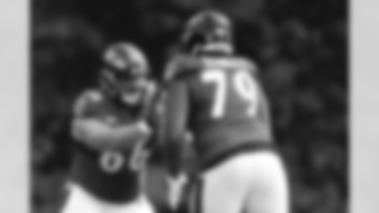 Baltimore Ravens guard Will Holden (66) works out with offensive tackle Ronnie Stanley (79) during an NFL football camp practice, Monday, Aug. 17, 2020, in Owings Mills, Md. (AP Photo/Julio Cortez)
