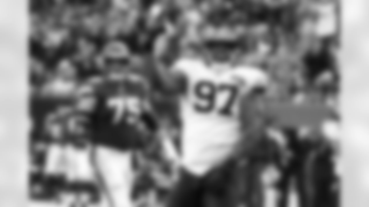 Chicago Bears defensive tackle Nick Williams (97) celebrates after sacking Minnesota Vikings quarterback Kirk Cousins as Vikings' Brian O'Neill (75) watches during the second half of an NFL football game Sunday, Sept. 29, 2019, in Chicago. (AP Photo/Matt Marton)