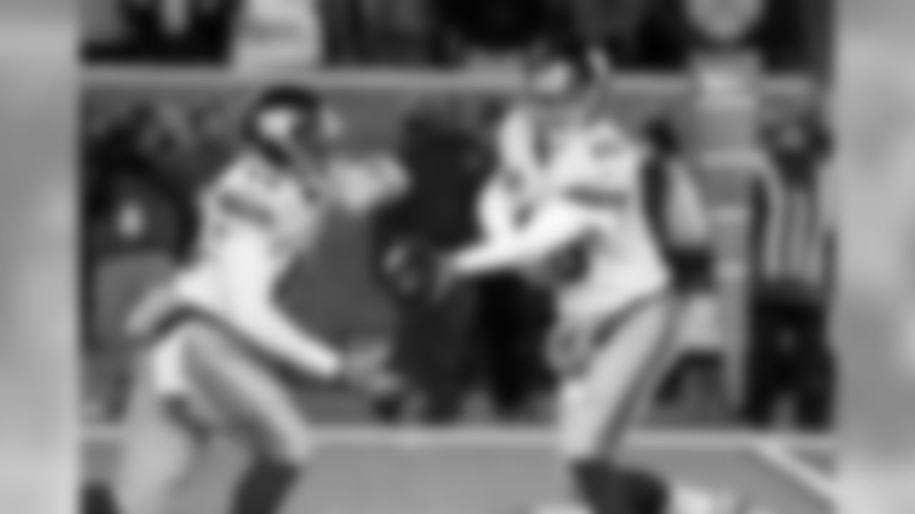 RB ANDRE WILLIAMS, QB ELI MANNING