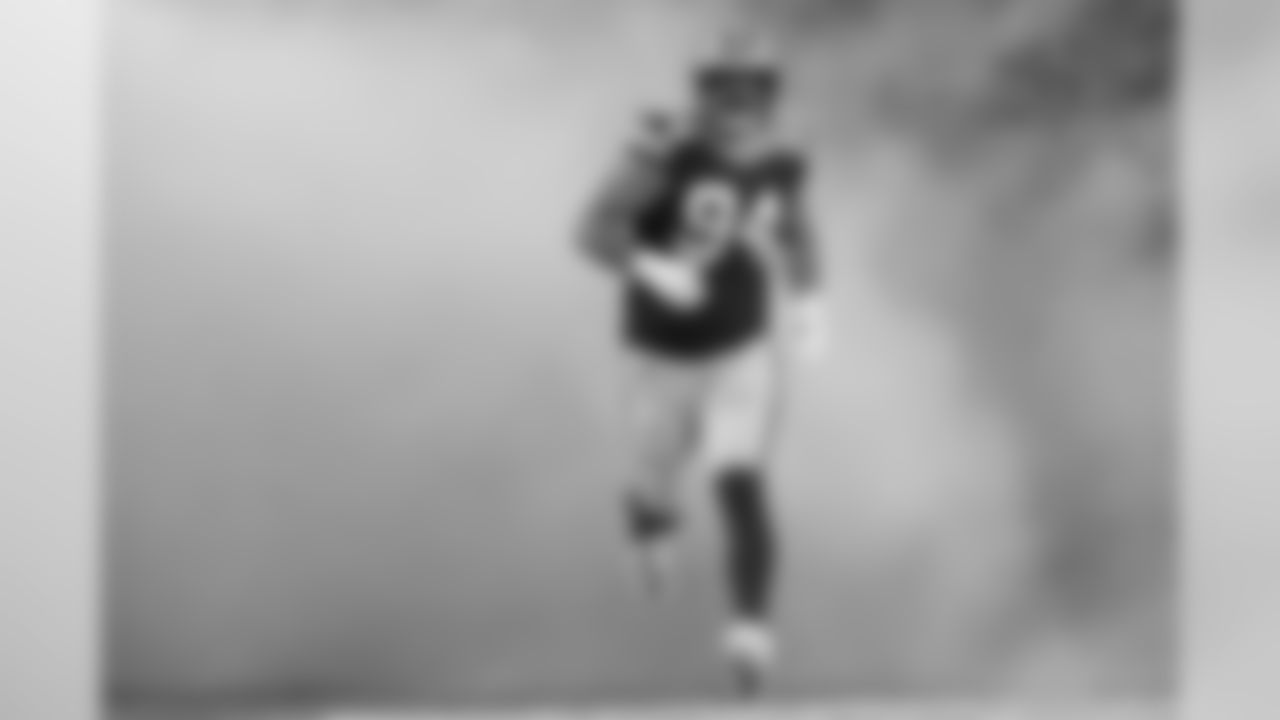 Green Bay Packers defensive end Dean Lowry (94) runs onto the field during player introductions prior to an NFL football game against the Philadelphia Eagles, Thursday, Sept. 26, 2019, in Green Bay, Wis. The Eagles defeated the Packers, 34-27. (Ryan Kang via AP)