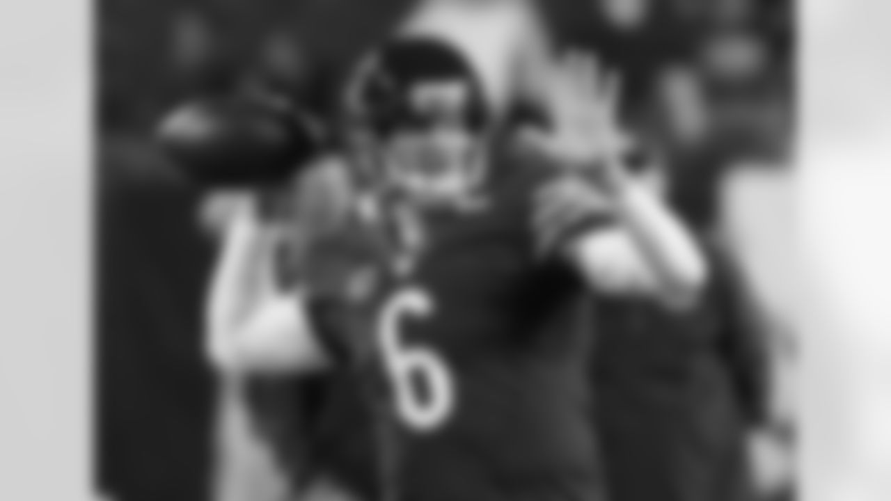 Chicago Bears quarterback Jay Cutler throws during warm-ups for the Bears' NFL football game against the New York Giants, Thursday, Oct. 10, 2013, in Chicago. (AP Photo/Charles Rex Arbogast)