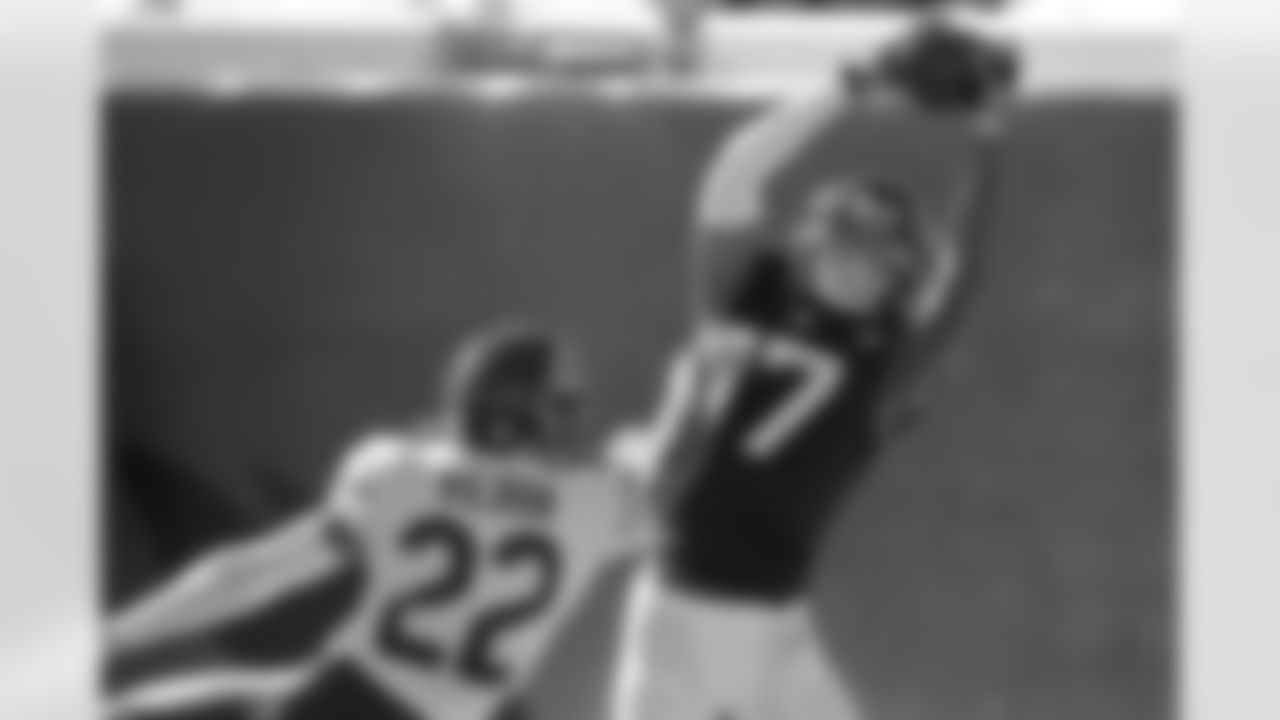 Jacksonville Jaguars receiver DJ Chark Jr. (17) hauls in a 20 yard touchdown catch overtop of Chicago Bears rookie cornerback Kindle Vildor (22) with 8:21 to play in the second quarter during an NFL football game, Sun, Dec. 27, 2020 in Jacksonville, Fla.