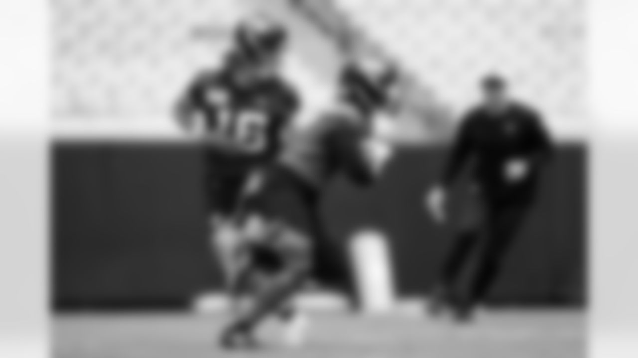 Jacksonville Jaguars quarterback Trevor Lawrence (16) and running back Travis Etienne Jr. (1) during OTAs at TIAA Bank Field in Jacksonville, FL on May 22, 2023. (Kam Nedd/Jacksonville Jaguars)