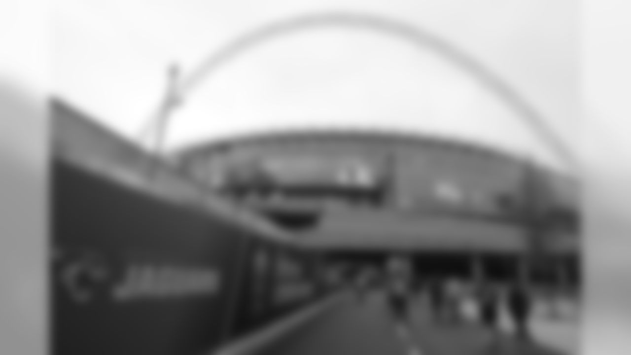 Fans walk outside the stadium before the first half of an NFL football game between the Houston Texans and the Jacksonville Jaguars at Wembley Stadium, Sunday, Nov. 3, 2019, in London. (AP Photo/Kirsty Wigglesworth)