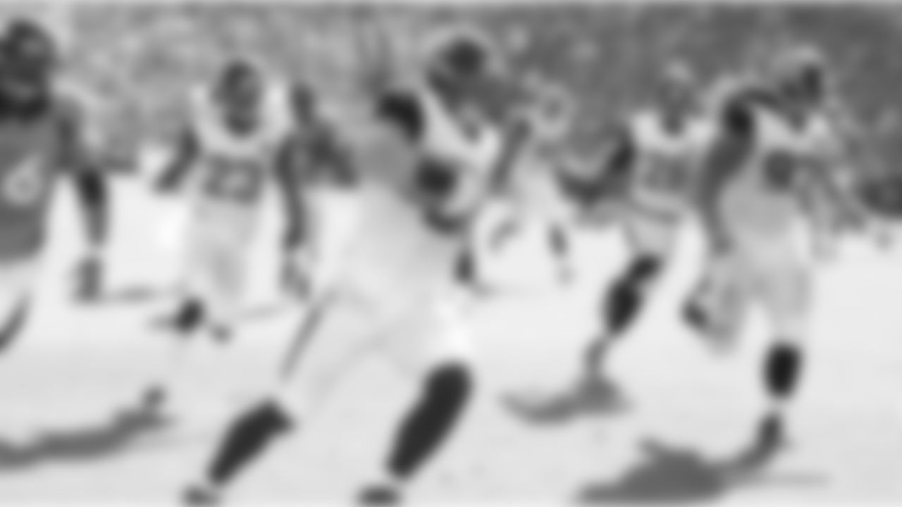 LB Paul Posluszny runs back an interception of Broncos QB Peyton Manning's pass in a Week 6 game in Denver.