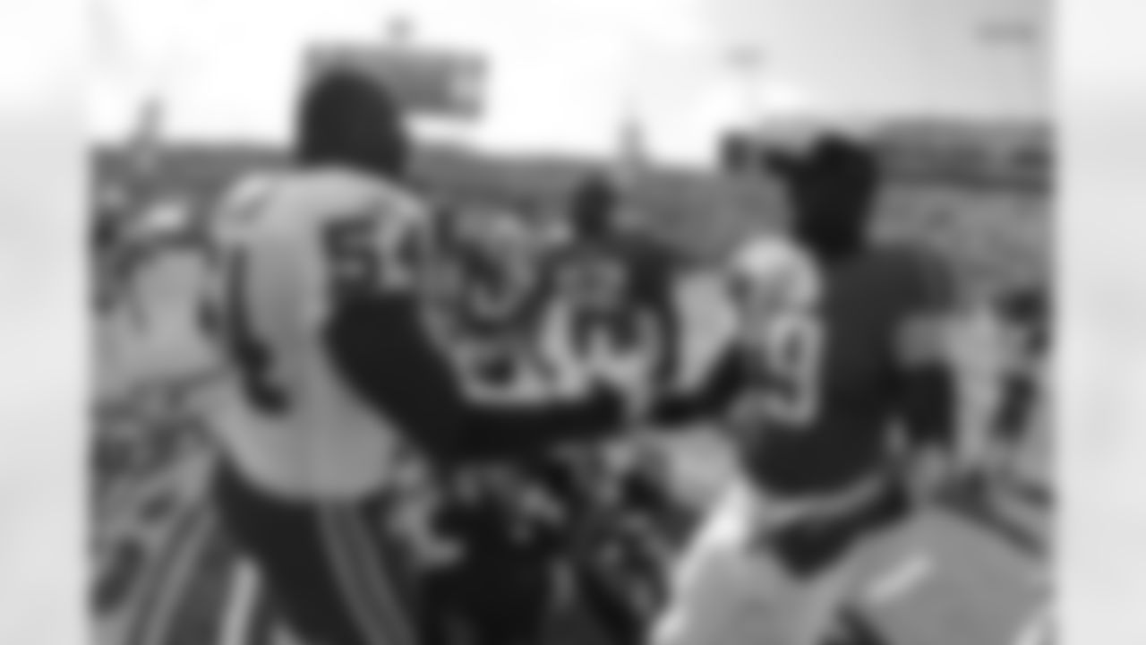 52 Daryl Smith, #9 David Garrard