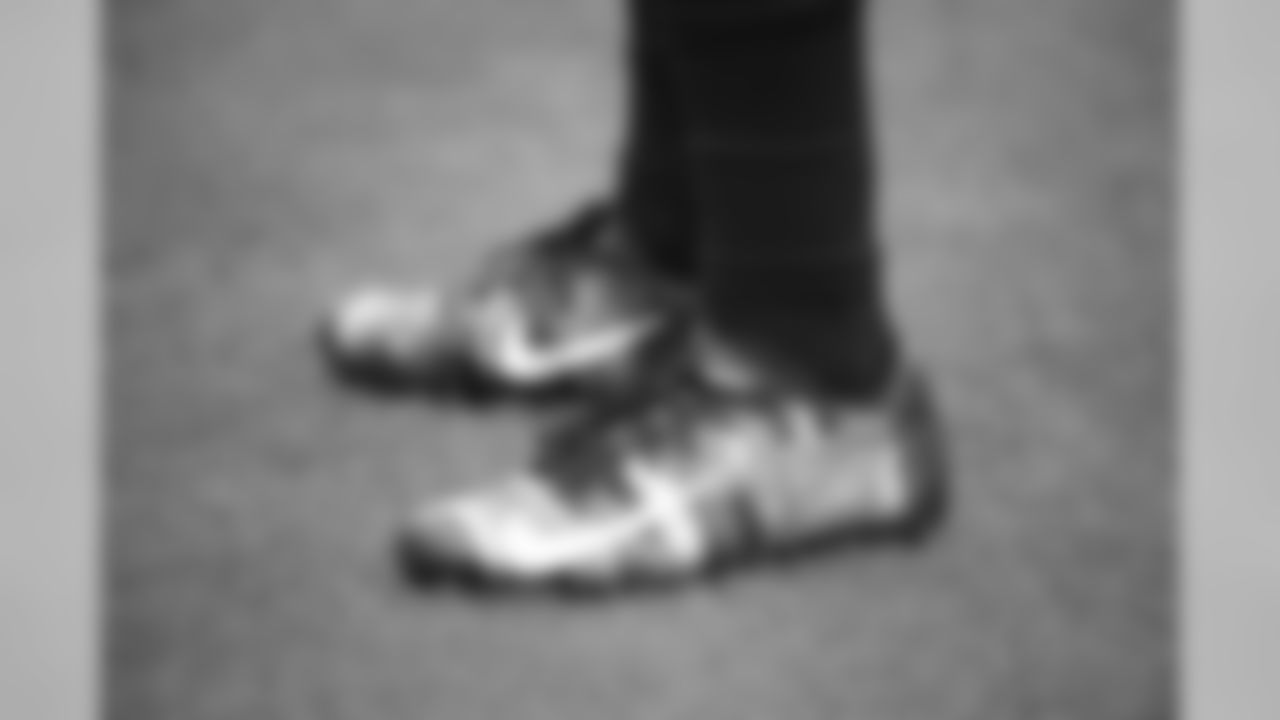Jacksonville Jaguars cornerback A.J. Bouye wears his cleats for a cause before an NFL football game against the Jacksonville Jaguars Sunday, Dec. 2, 2018, in Jacksonville, Fla. (AP Photo/Phelan M. Ebenhack)