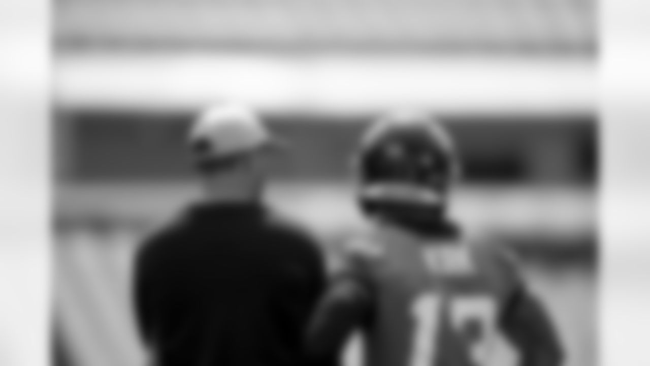Jacksonville Jaguars offensive coordinator Press Taylor and wide receiver Christian Kirk (13) during OTAs at TIAA Bank Field in Jacksonville, FL on May 29, 2023. (Kam Nedd/Jacksonville Jaguars)