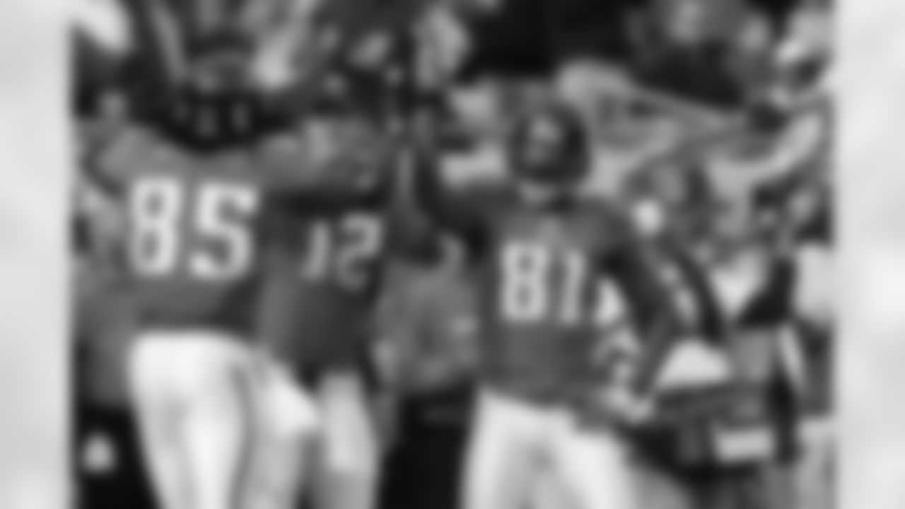 85 Ernest Wilford, #12 Luke McCown, #81 Torry Holt