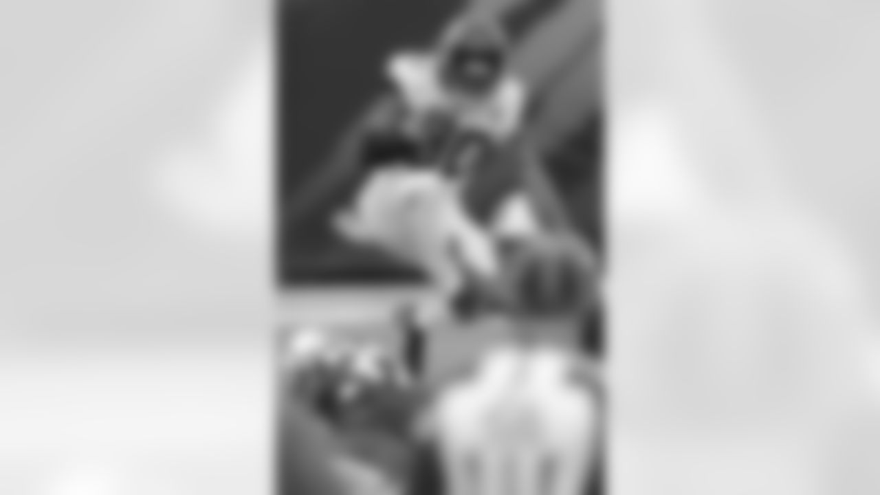 Jacksonville Jaguars rookie free agent running back James Robinson (30) hurdles a couple of Indianapolis Colts would be tacklers after a catch with 8:56 to play in the fourth quarter during an NFL football game, Sunday, September 13, 2020 in Jacksonville, Fla.
