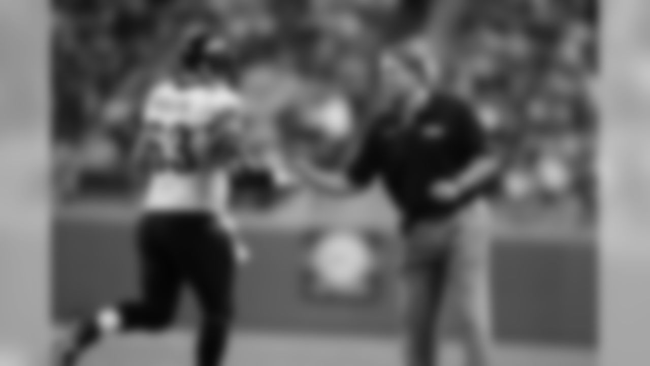 63 Brad Meester, Jack Del Rio