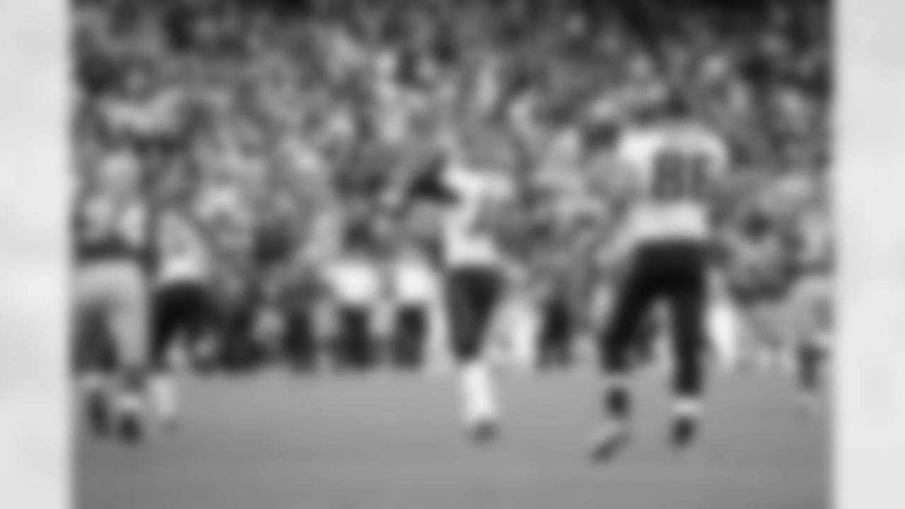 10 Josh Scobee, #86 Zach Miller