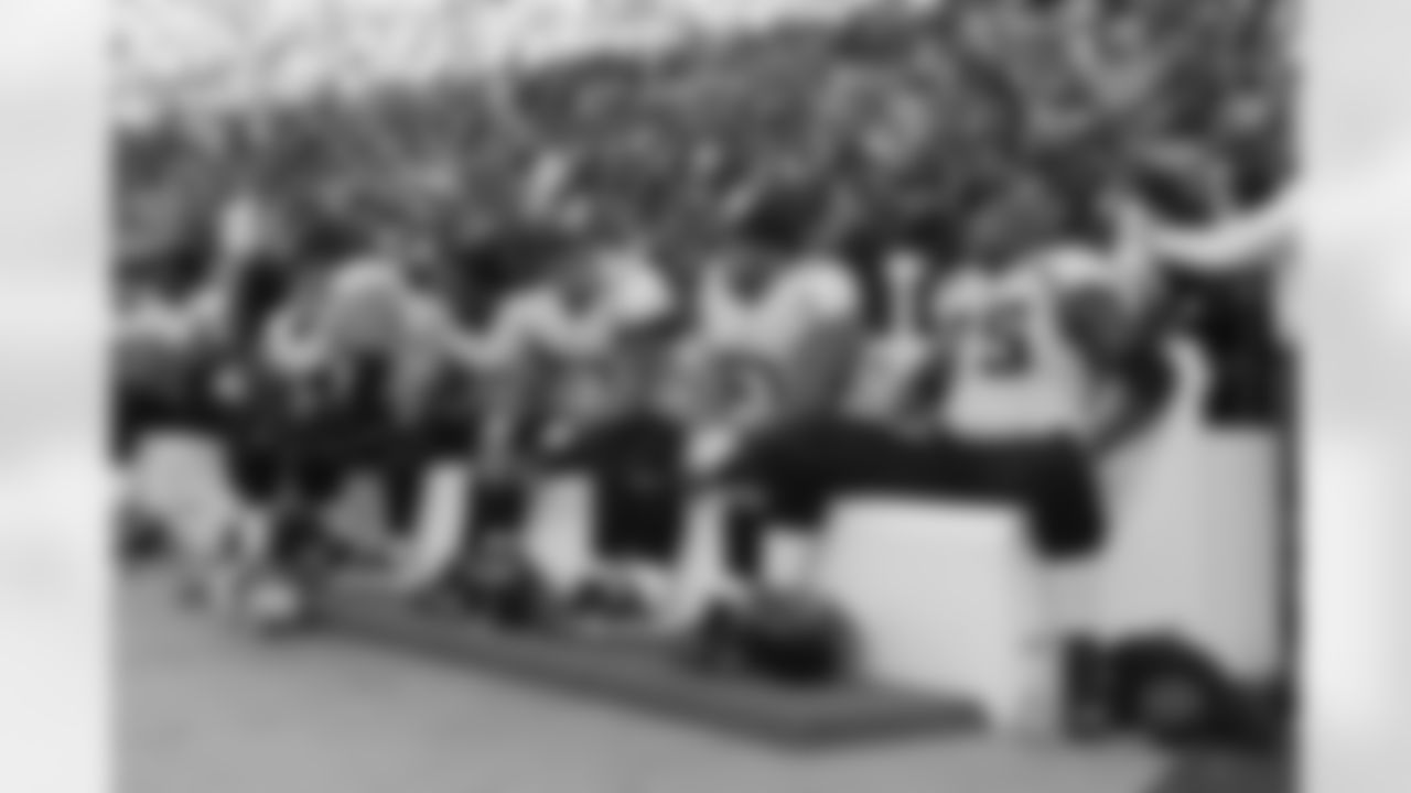 63 Brad Meester, #67 Vince Manuwai, #75 Eugene Monroe