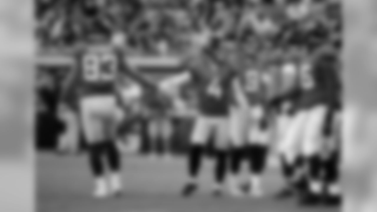 Jacksonville Jaguars kicker Josh Lambo (4) is congratulated by tight end Ben Koyack (83) and others after kicking a field goal against the New Orleans Saints during the first half of an NFL preseason football game, Thursday, Aug. 9, 2018, in Jacksonville, Fla. (AP Photo/Stephen B. Morton)