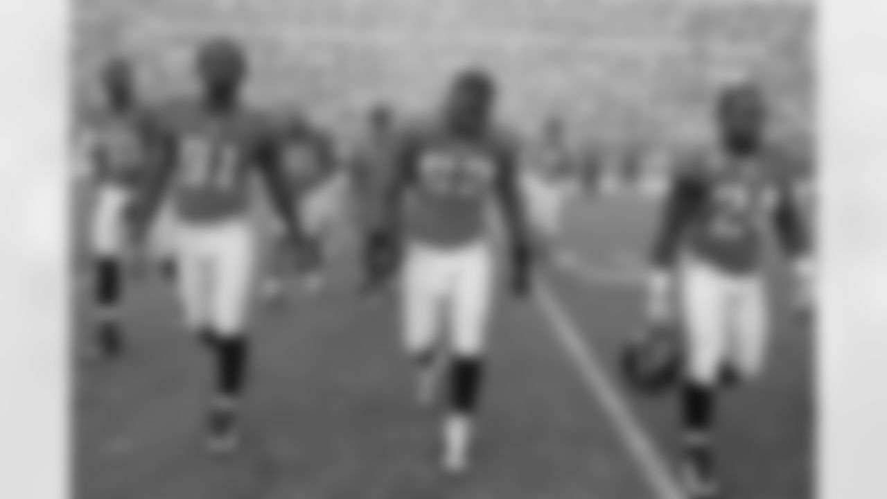 89 Marcedes Lewis, #91 Derrick Harvey, #81 Torry Holt, #52 Daryl Smith, #24 Montell Owens