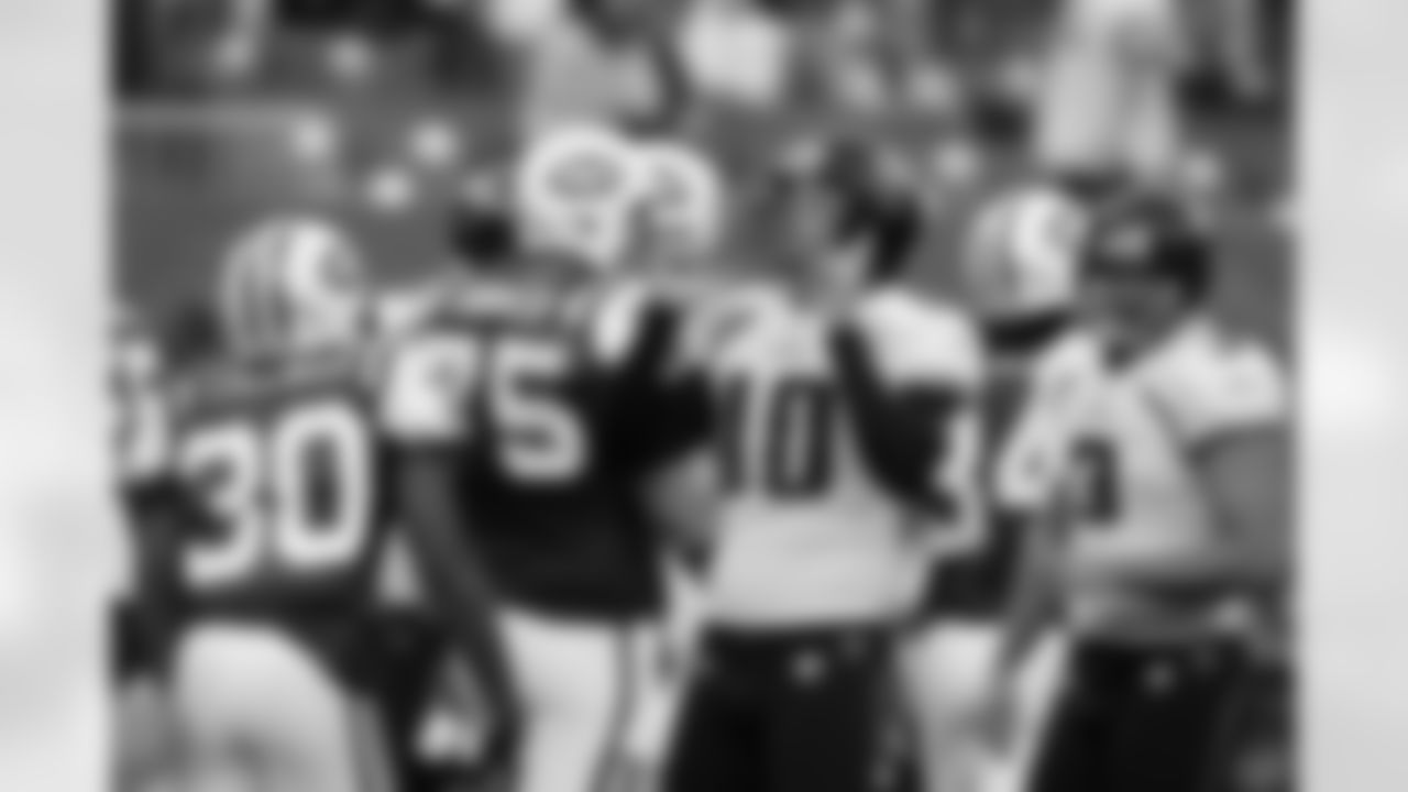 10 Josh Scobee, #3 Adam Podlesh