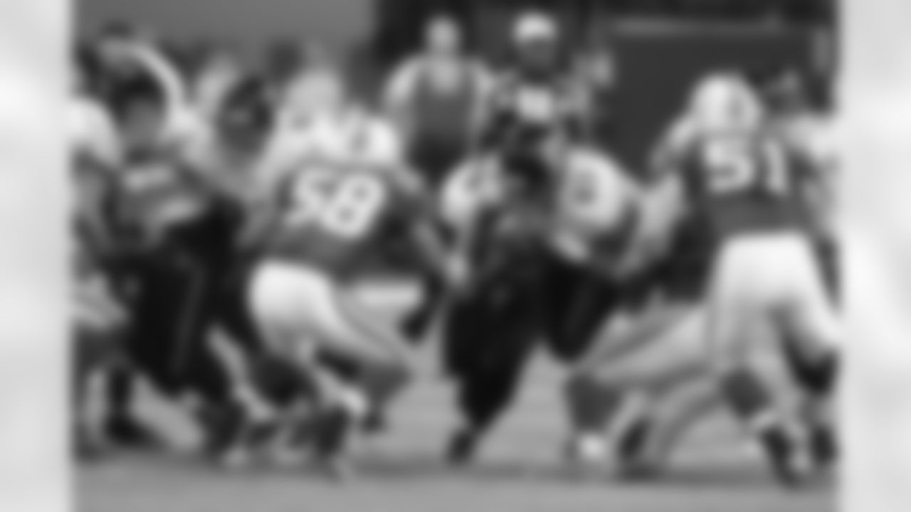 77 Uche Nwaneri, #63 Brad Meester, #9 David Garrard, #67 Vince Manuwai