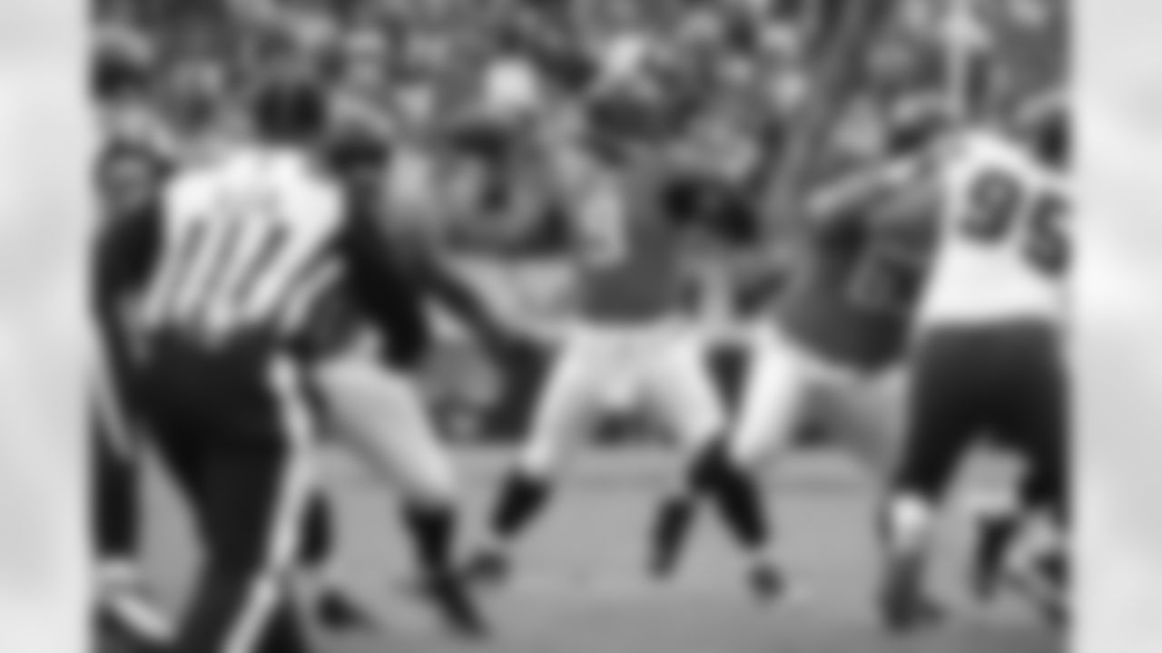 9 David Garrard, #63 Brad Meester