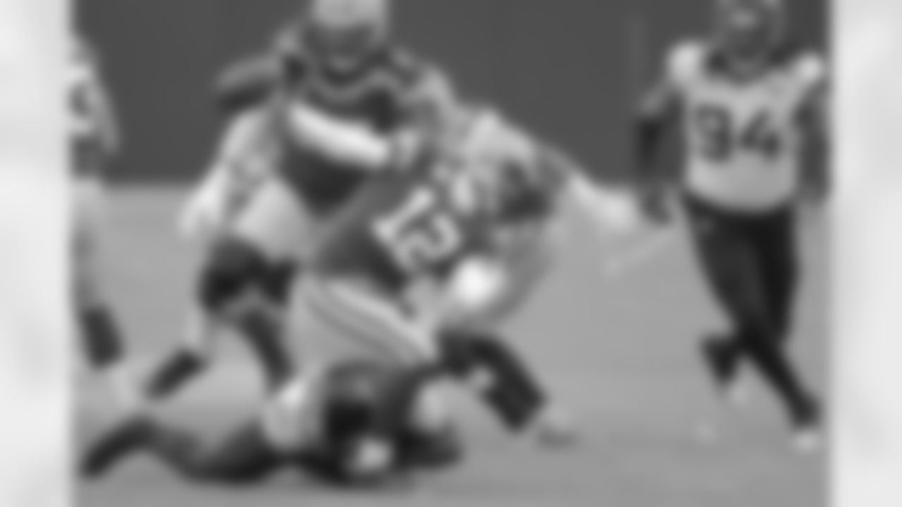 Jacksonville Jaguars defensive end Josh Allen (41) sacks Green Bay Packers quarterback Aaron Rodgers (12) but was called for roughing the passer on the third quarter play during an NFL football game, Sunday, Nov. 15, 2020 in Green Bay, Wi.