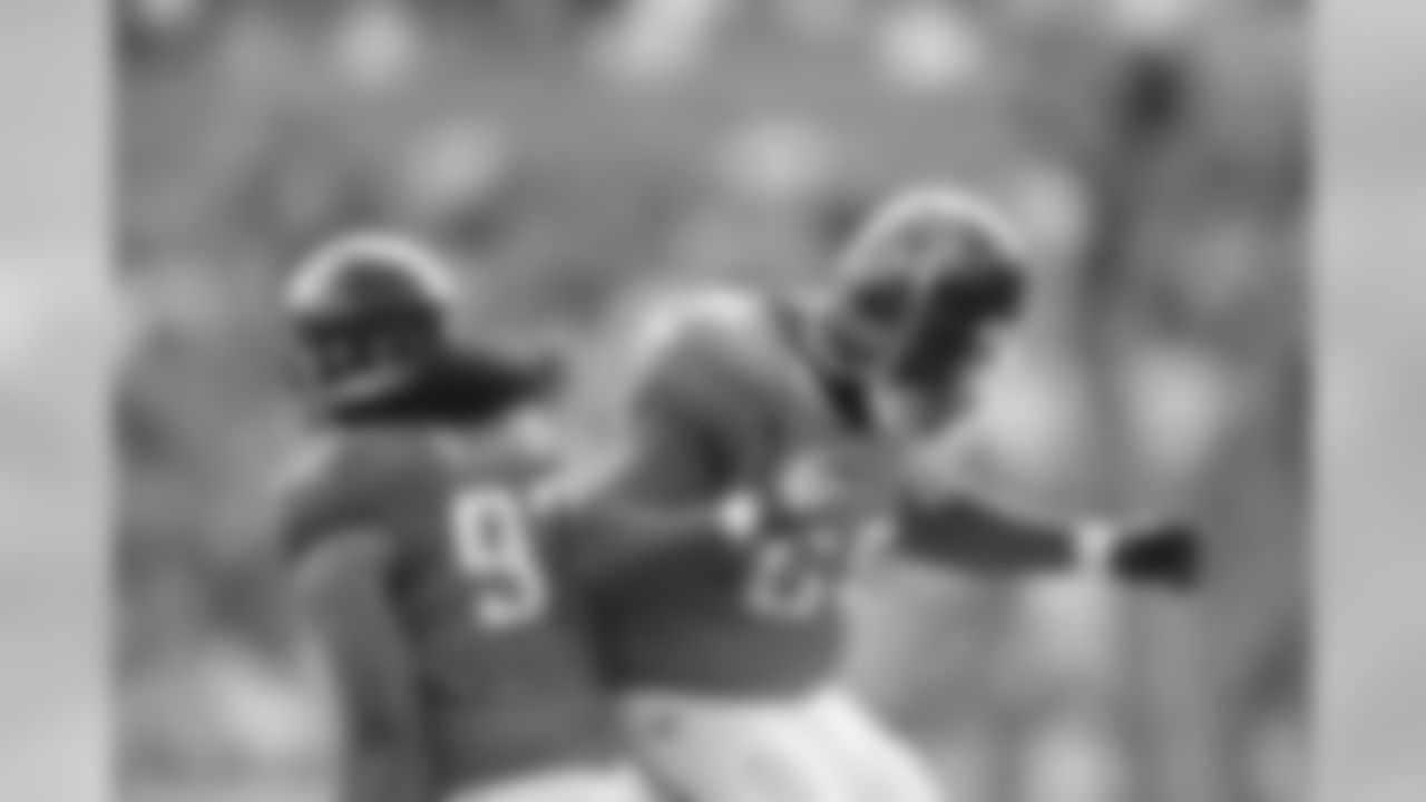 93 Tyson Alualu, #69 Ledger Douzable