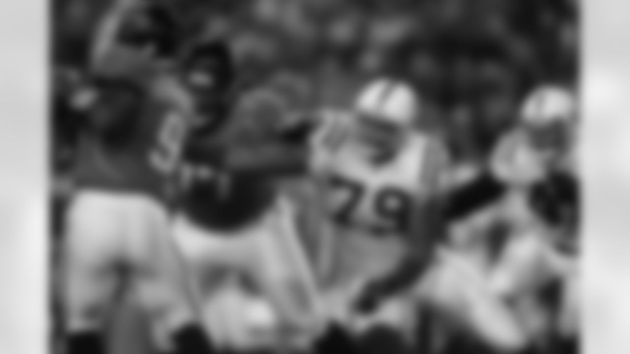9 David Garrard, #77 Uche Nwaneri