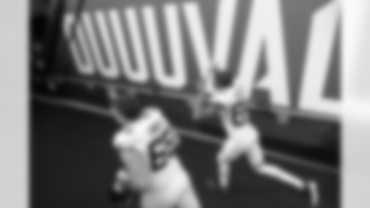 Jacksonville Jaguars center Brandon Linder (65) and receiver Keelan Cole (84) leave the field after the victory against the Indianapolis Colts during an NFL football game, Sunday, September 13, 2020 in Jacksonville, Fla.