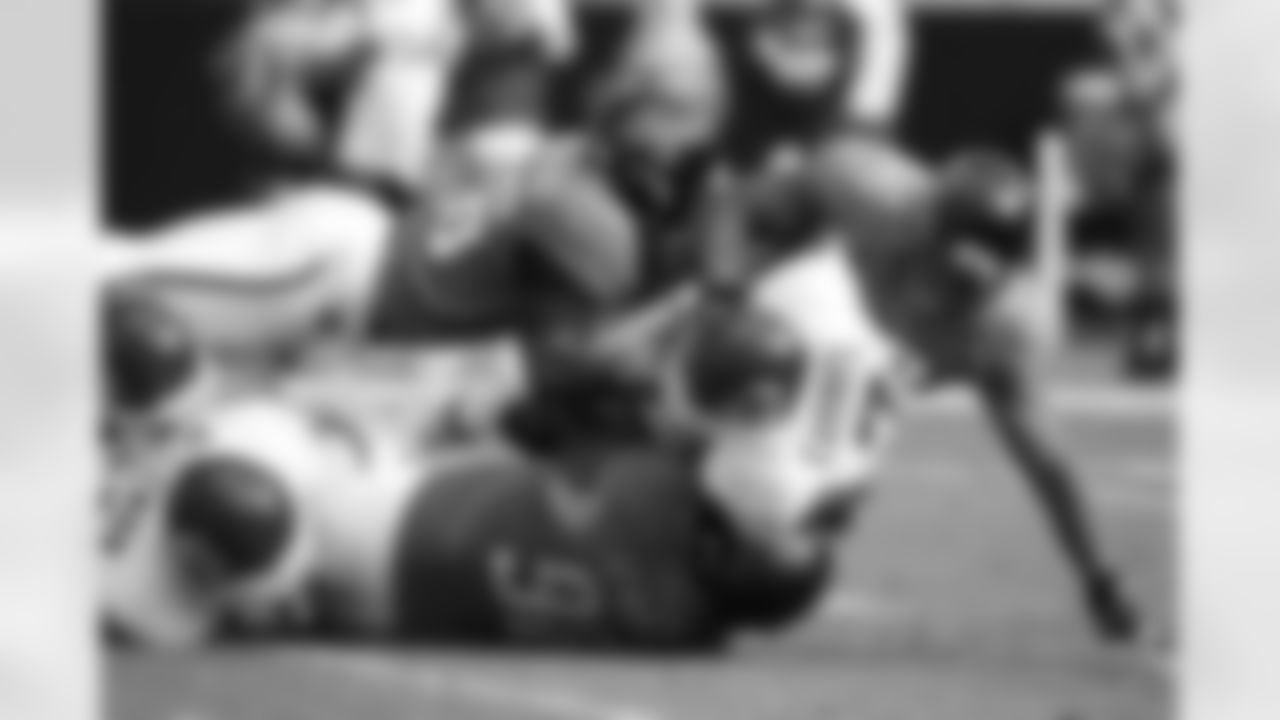56 Justin Durant, #52 Daryl Smith, #98 John Henderson
