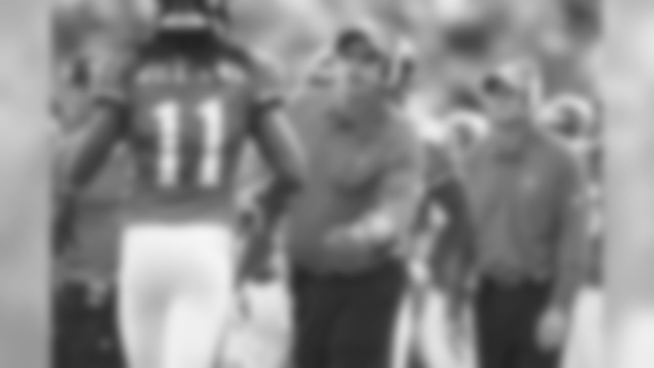 11 Reggie Williams, Jack Del Rio