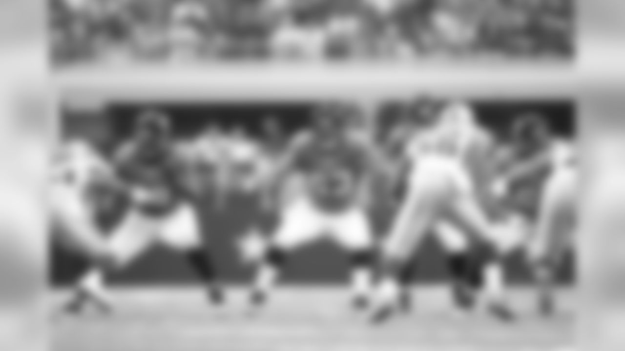 77 Uche Nwaneri, #63 Brad Meester, #9 David Garrard