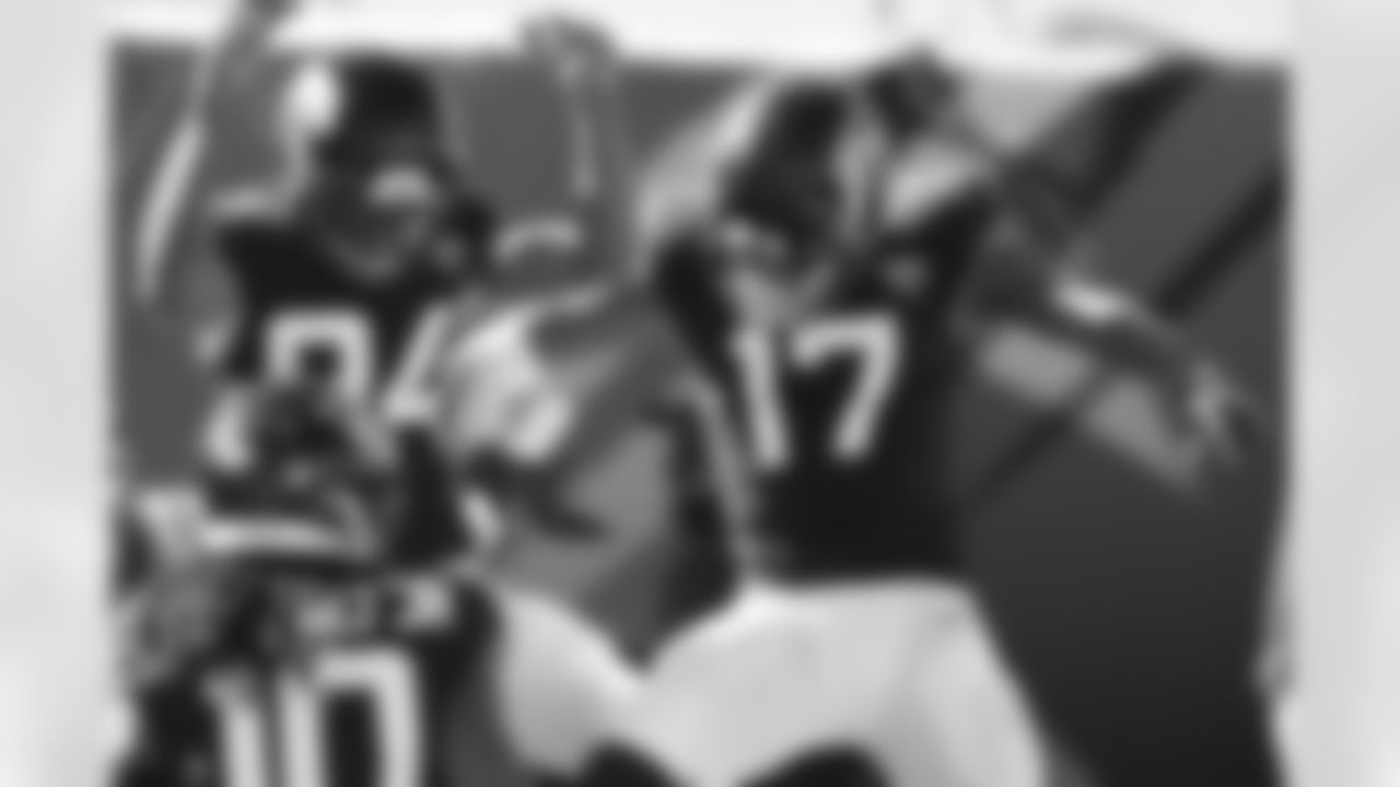 Jacksonville Jaguars receiver DJ Chark Jr. (17) celebrates his 20 yard touchdown catch with teammate Keelan Cole (84) against the Chicago Bears with 8:21 to play in the second quarter during an NFL football game, Sun, Dec. 27, 2020 in Jacksonville, Fla.