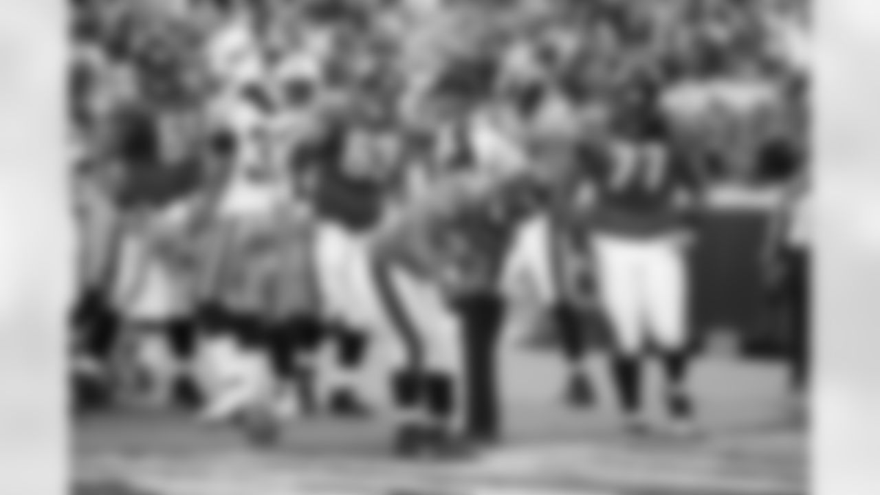 63 Brad Meester, #32 Maurice Jones-Drew, #77 Uche Nwaneri