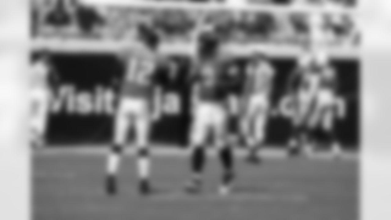 12 Luke McCown, #9 David Garrard