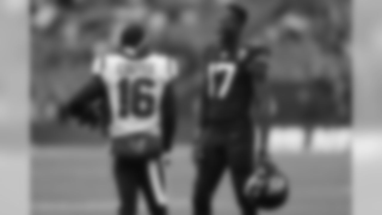Jacksonville Jaguars wide receiver D.J. Chark (17) speaks with Houston Texans wide receiver Keke Coutee (16) ahead of an NFL football game at Wembley Stadium, Sunday, Nov. 3, 2019, in London. (AP Photo/Kirsty Wigglesworth)