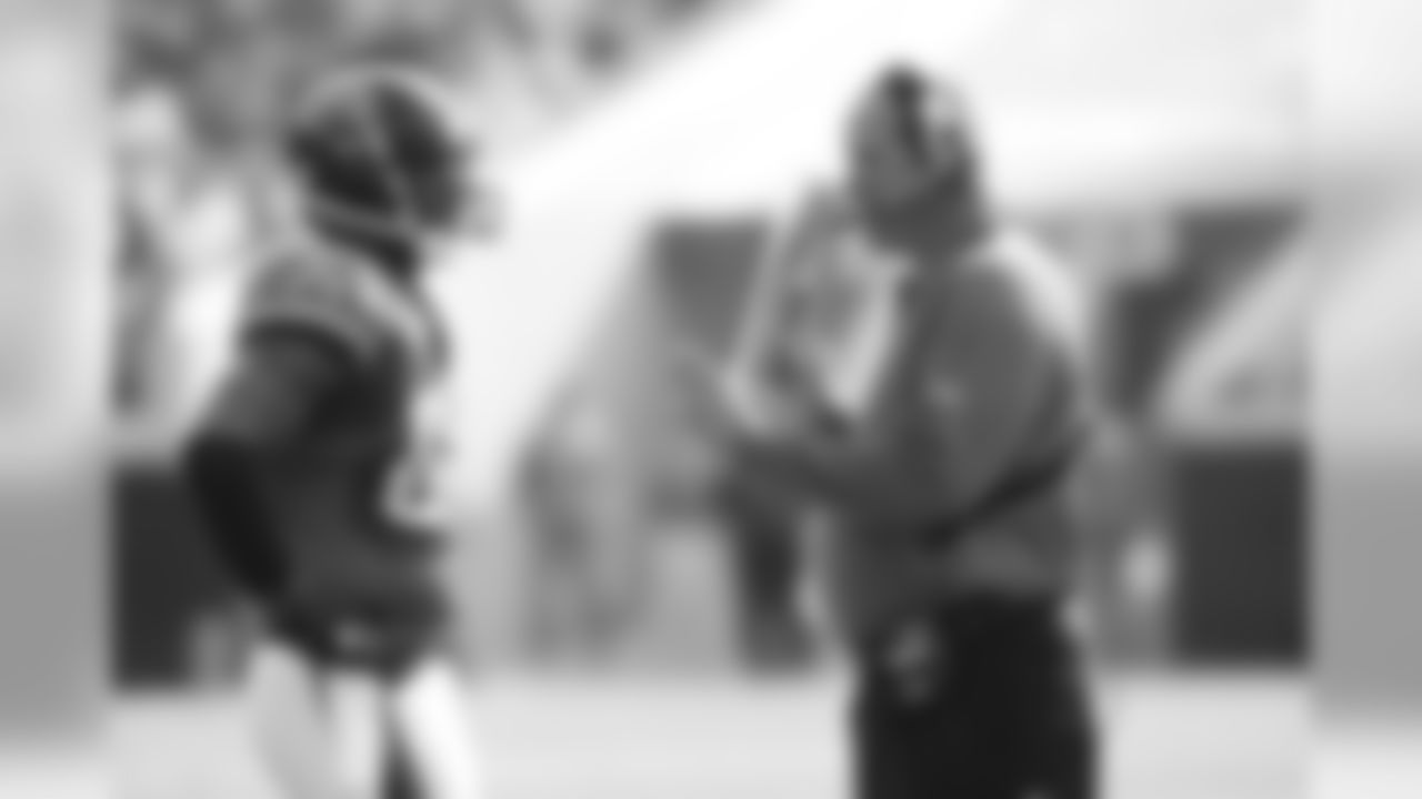 89 Marcedes Lewis, Mike Tice