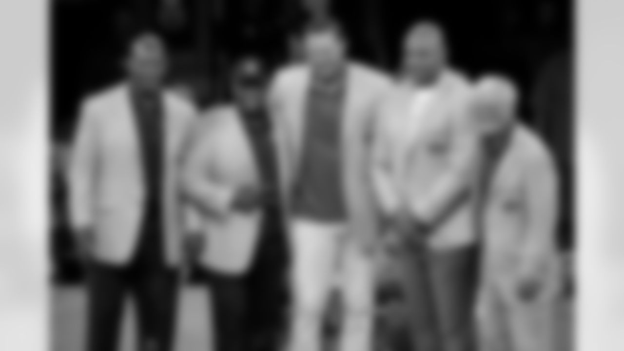 Members of the Pro Football Hall of Fame Class of 2022, pose together after participating in an enshrinees' roundtable in Canton, Ohio, Sunday, Aug. 7, 2022. From left they are: Bryant Young, LeRoy Butler, Tony Bocelli, Richard Seymour and Dick Vermeil. Not shown are Cliff Branch, Art McNally, and Sam Mills. (AP Photo/Gene J. Puskar)