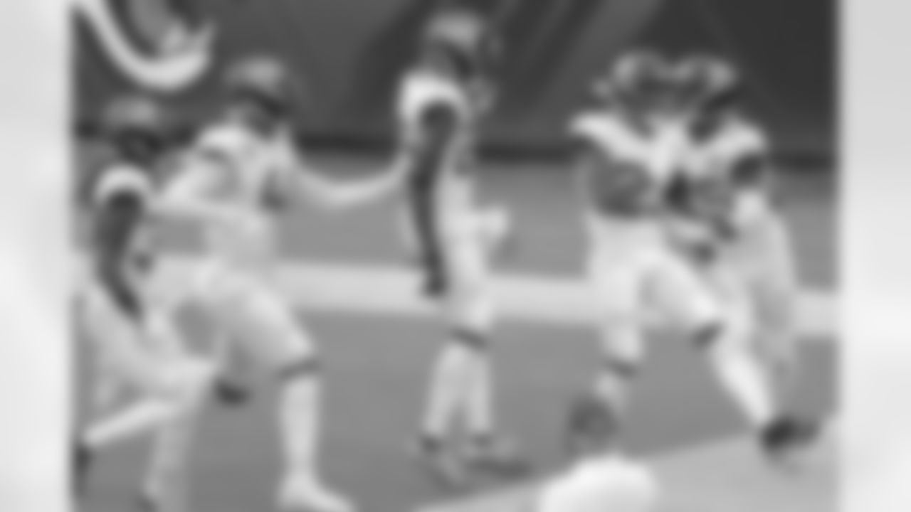 Jacksonville Jaguars rookie cornerback C.J. Henderson (23) celebrates his first career interception with teammates against the Indianapolis Colts with 12:50 to play in the second quarter during an NFL football game, Sunday, September 13, 2020 in Jacksonville, Fla.