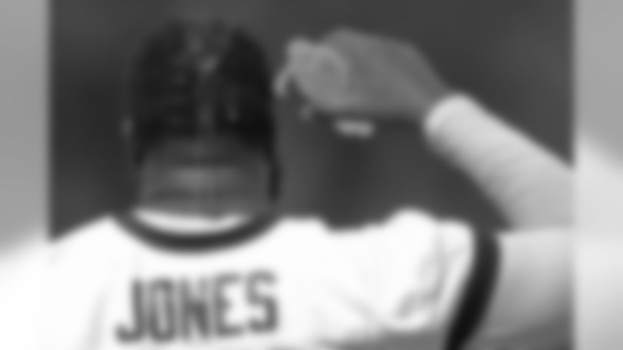 Jacksonville Jaguars defensive tackle Abry Jones (95) dumps water on his head to cool off during a training camp practice session, Wednesday, August 12, 2020 in Jacksonville, Fla.