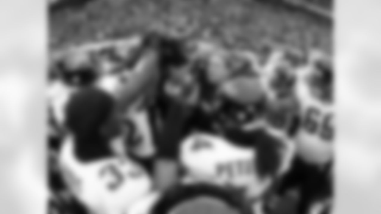 33 Greg Jones, #54 Mike Peterson, Jack Del Rio