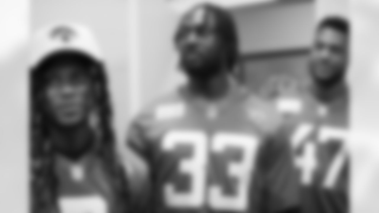 Jaguars LB Devin Lloyd (33), OLB De'Shaan Dixon (47) and CB Chris Claybrooks (6) tour NAS JAX military base on June 9, 2023.