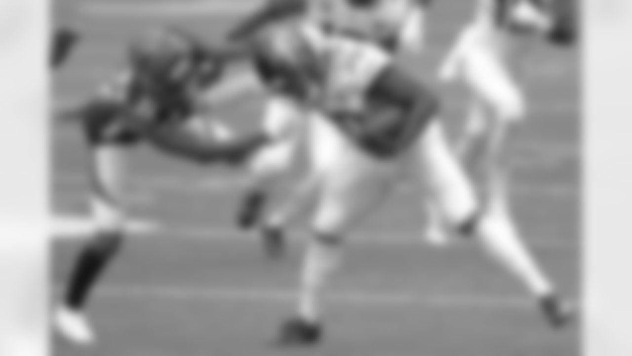 Jacksonville Jaguars rookie running back James Robinson (30) attepmts to fight off Cincinnati Bengals cornerback William Jackson III (22) during an NFL football game, Sunday, Oct. 4, 2020 in Cincinnati, OH.
