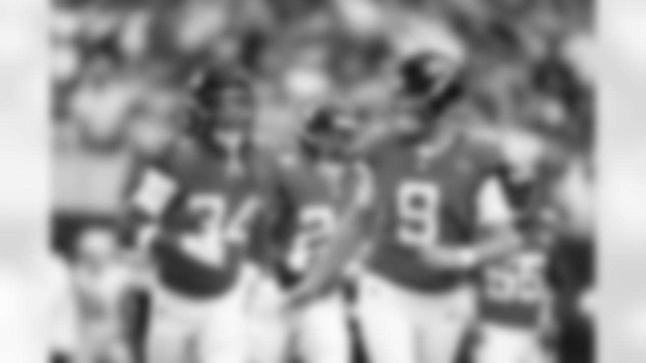 Jacksonville Jaguars vs. Dallas Cowboys
CB Gregory Junior (34) and P Logan Cooke (9)